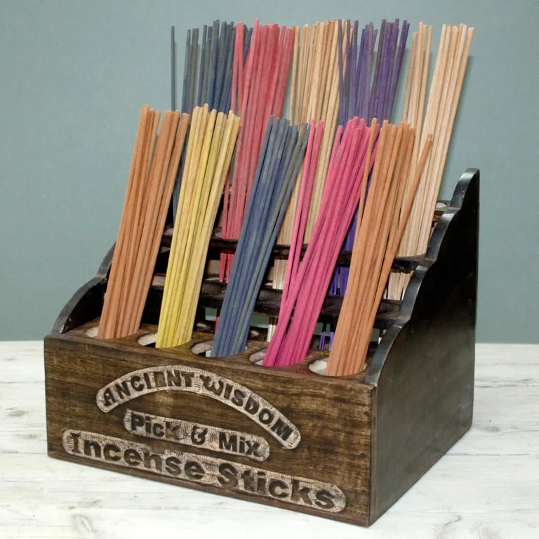 P&M incense display stand crafted from mango wood, featuring carved profile and multiple holder slots