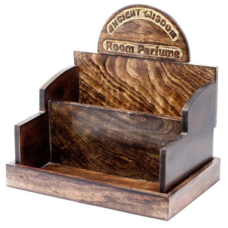 Mango wood perfume stand on a tabletop in a living room.
