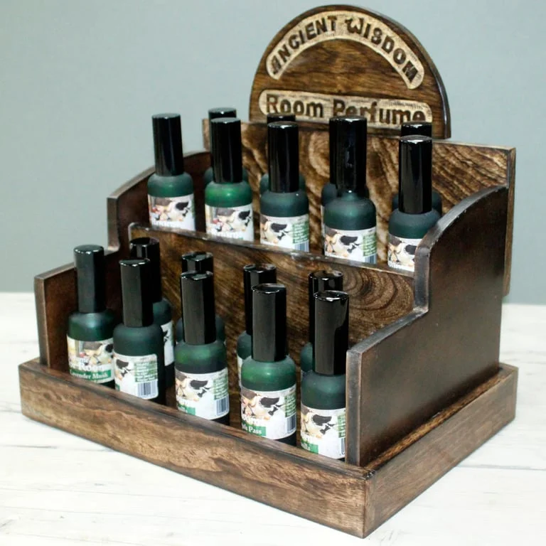 Mango wood perfume holder wooden display stand showing elegant perfume bottles