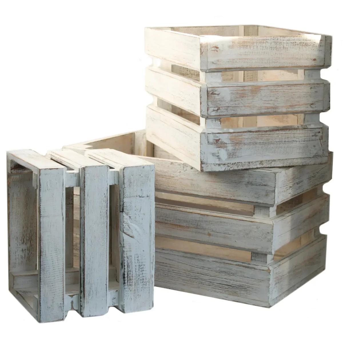 Three whitewashed wooden storage crates on display.
