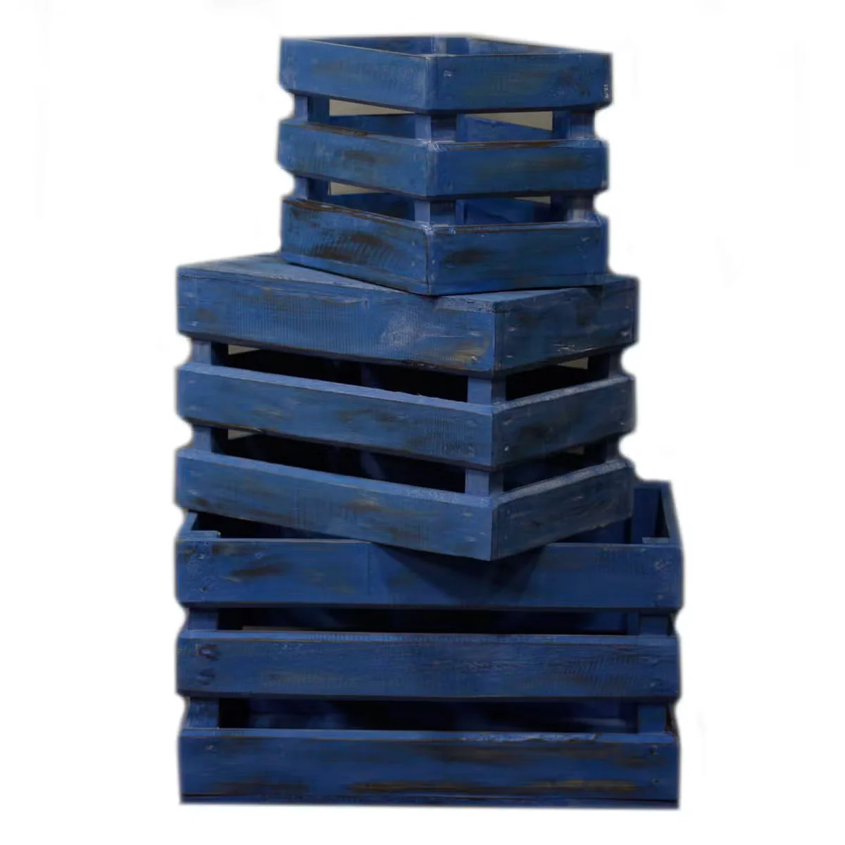 Bluewashed wooden crate set of three, arranged together.