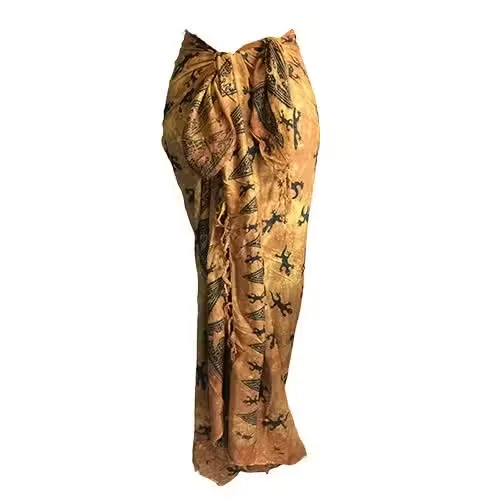 Chocolate sarong from Bali Gecko, featuring a tropical pattern.
