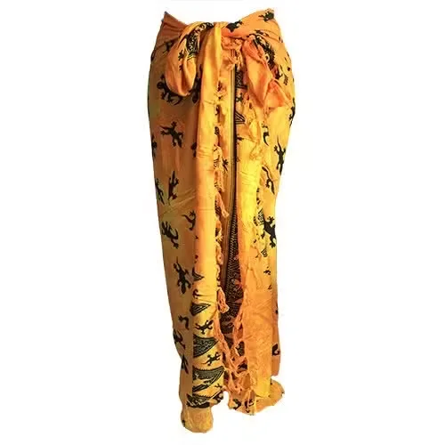 Yellow Bali sarong featuring a Bali gecko pattern.