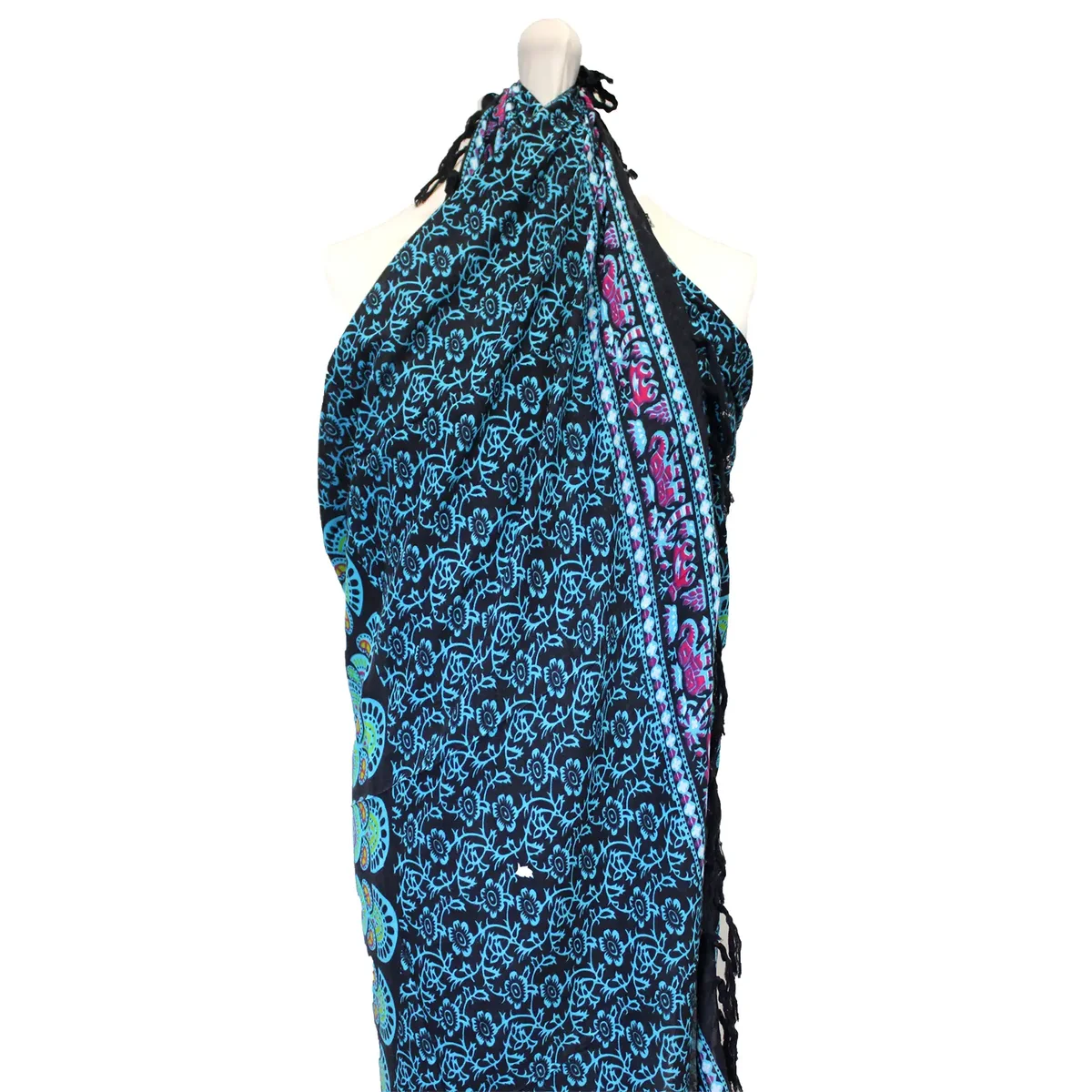 Vibrant peacock beach wrap showcasing a mandala design.