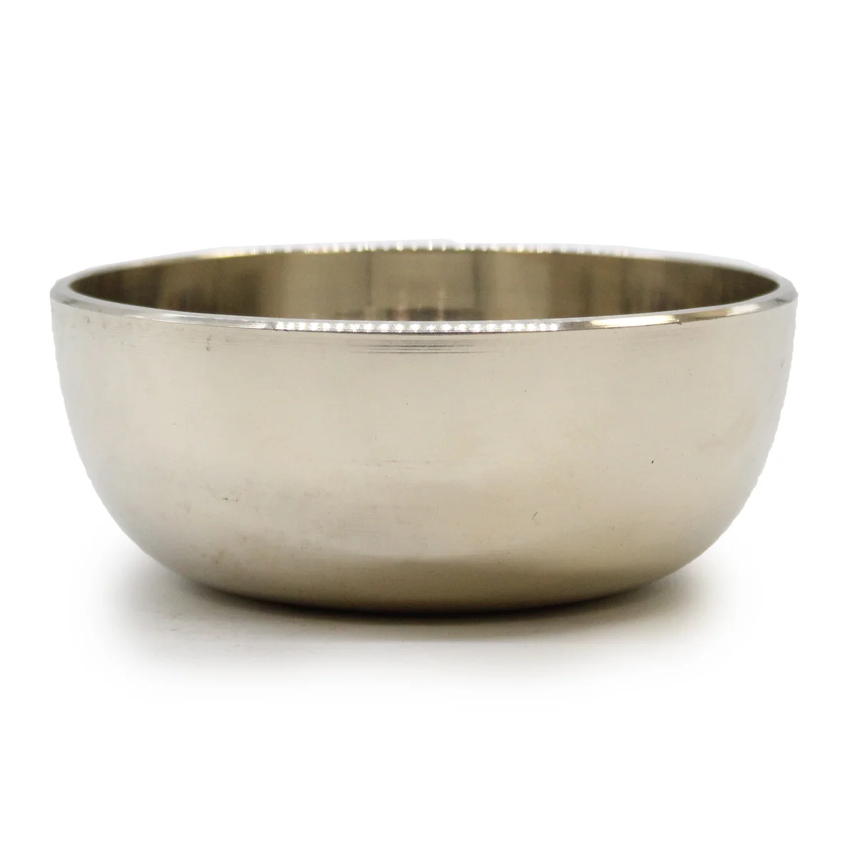 12cm brass bowl, medium sized, smooth bright brass surface, typically used as a sing bowl