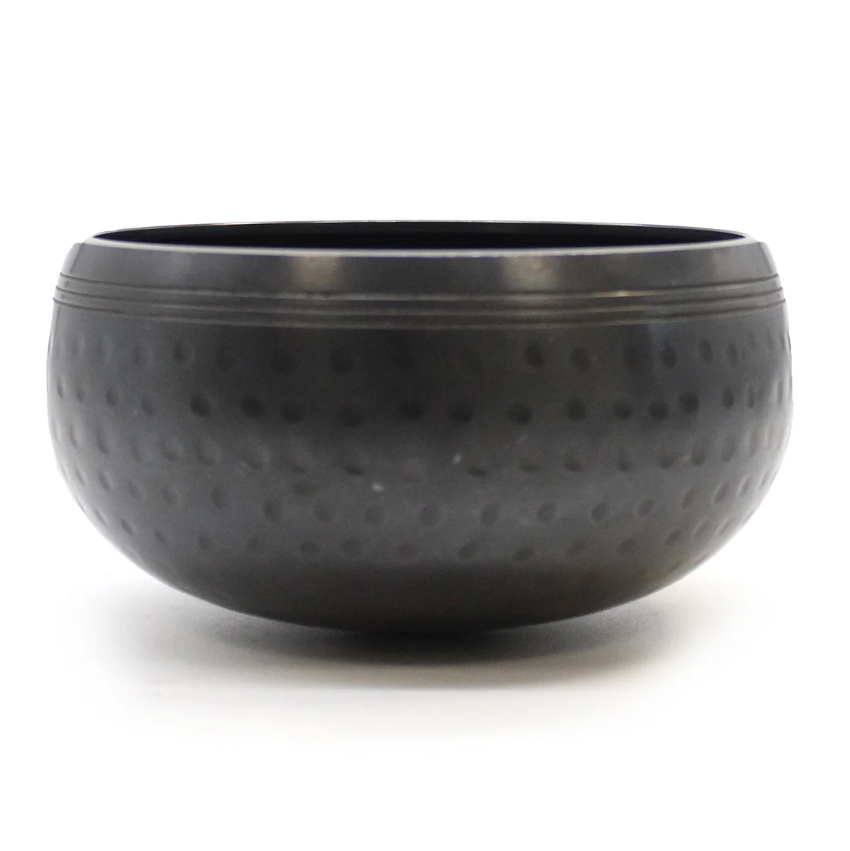 Small black beaten bowl, 14cm, textured metal finish.