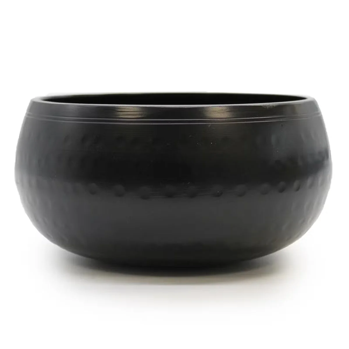 Medium black beaten bowl, 15cm, curved edges with textured finish.
