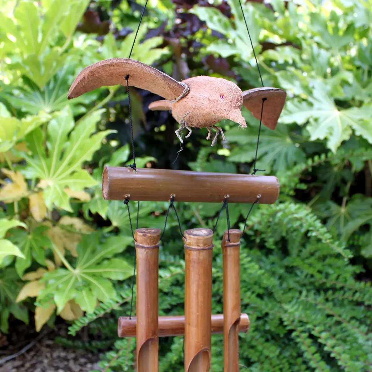 Blackbird wind chime crafted from coconut shells