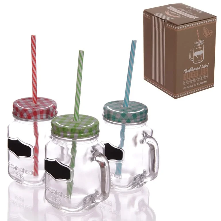 Green vintage drinking jar with chalkboard surface, showcasing rustic design.