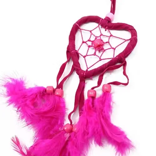 Small heart‑shaped balinese turq dreamcatcher with pink and purple beads.