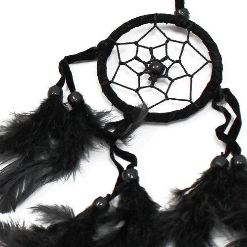 Small round Bali dreamcatcher wall art in black, white and red.