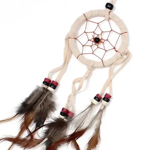 Small round dreamcatcher in cream, coffee and chocolate shades, featuring a woven trap with dangling beads.