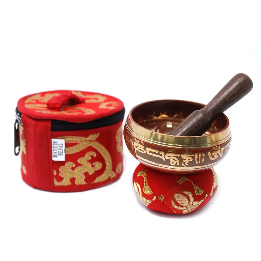 Mini singing bowl gift set in red, featuring a small bowl and accompanying accessories
