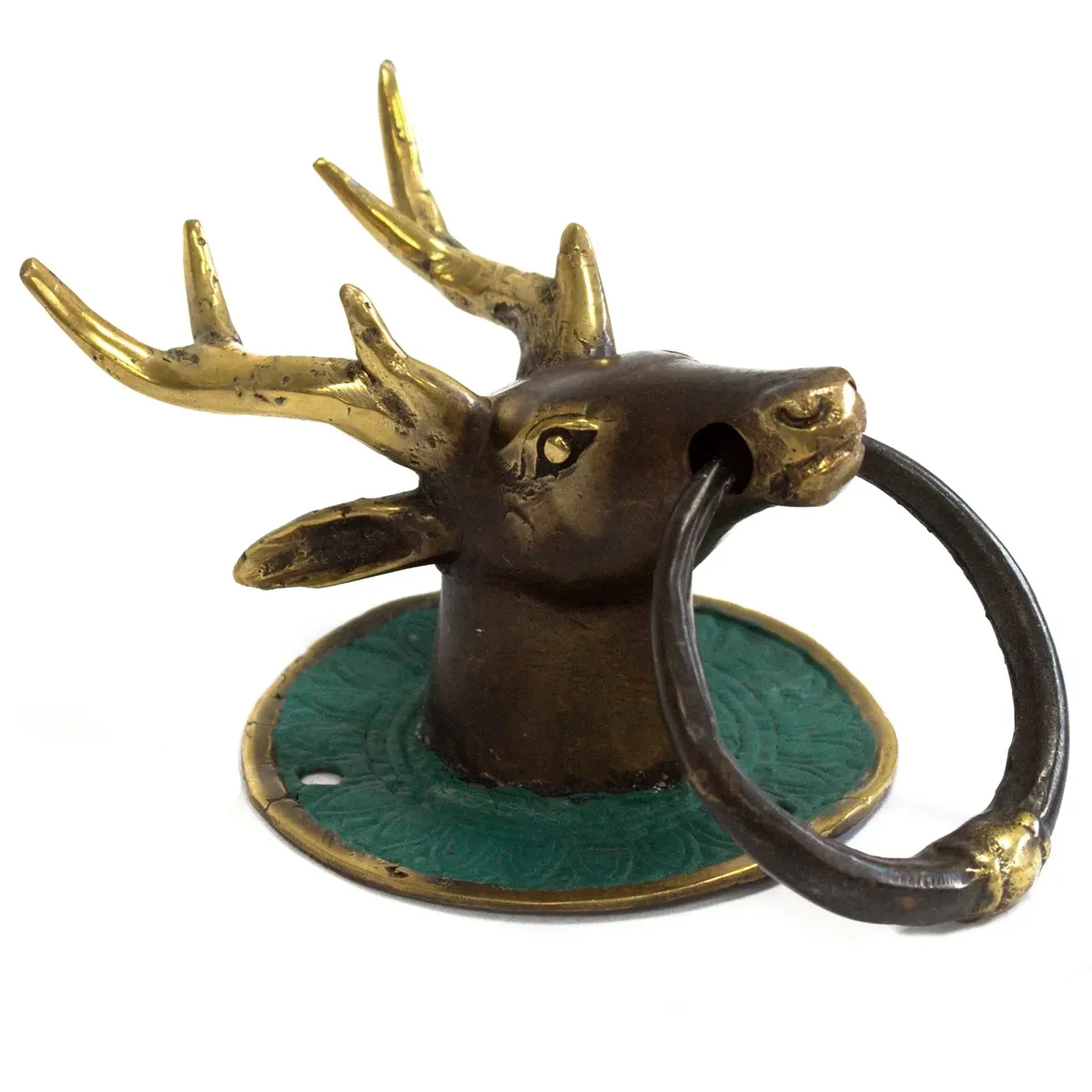 Brass stag door knocker featuring a stag head.