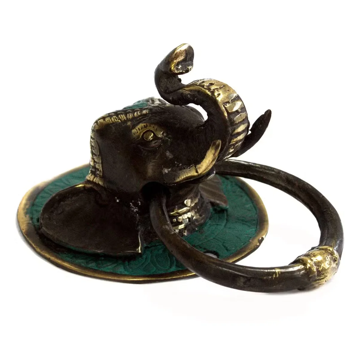 Brass elephant head metal door knocker with realistic stylised tusks and textured surface