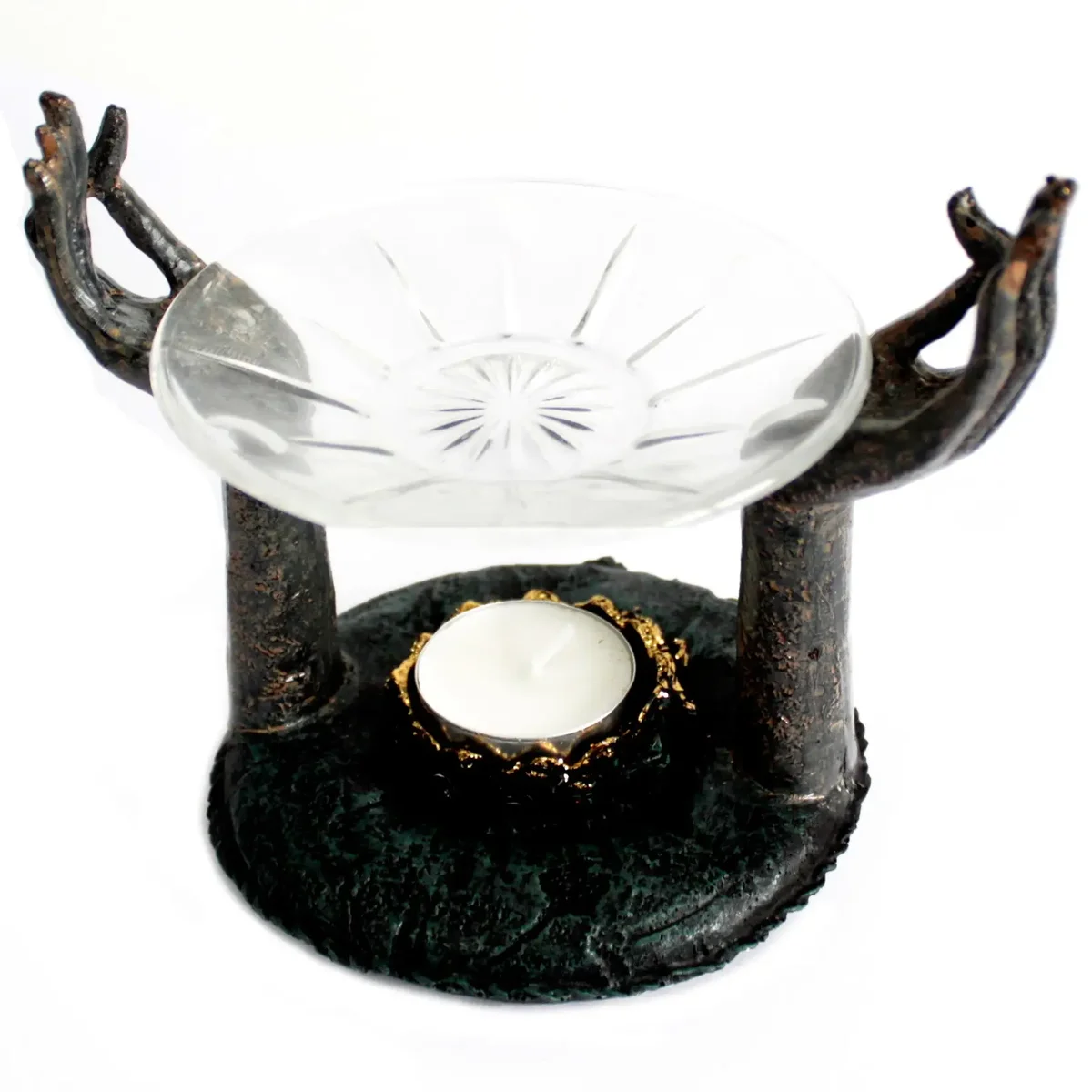 Antique Buddha burner featuring a seated Buddha with Om hand symbol and a small oil burner base.