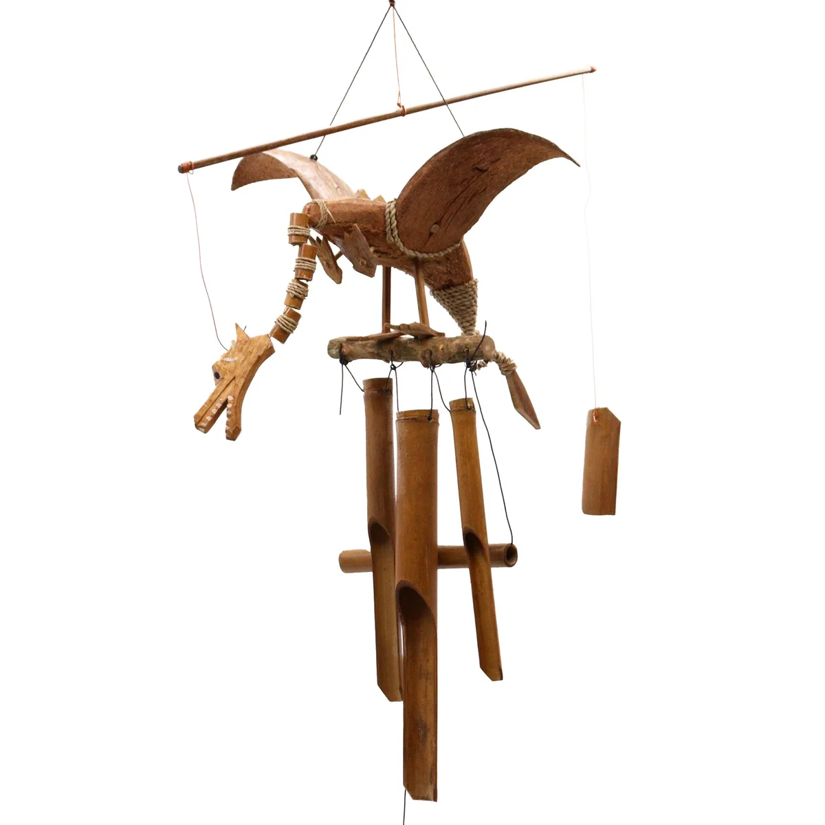 Coconut wind chime featuring a delicate dragon motif hanging from a tree branch, strands fluttering gently in the breeze.