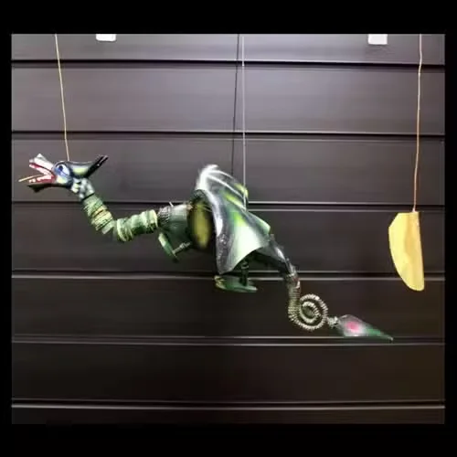 Large green coconut dragon mobile, a green dragon wall hanging.