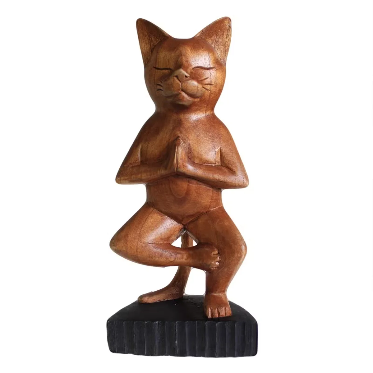Handcarved yoga cat ornament with one leg, a whimsical wooden pet figurine