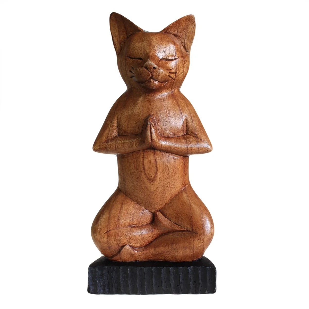 Handcarved cat sculpture of a yoga cat in lotus pose, detailed wooden craftsmanship, natural finish