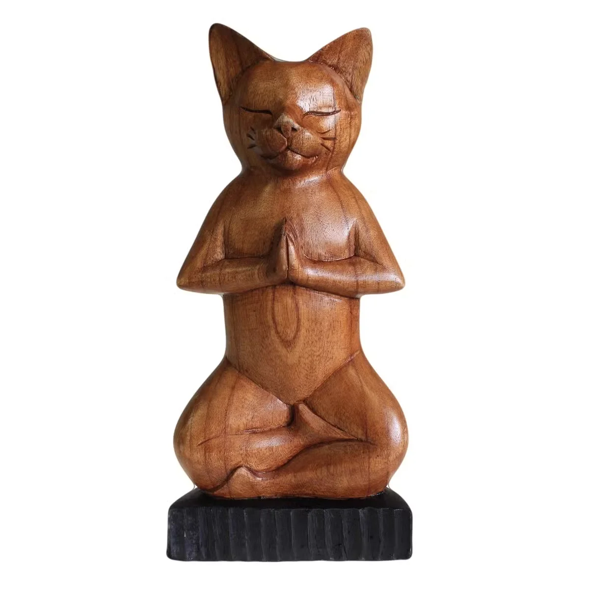 Handcarved lotus yoga cat decor showing a cat in a yoga pose with lotus flower details on wood background