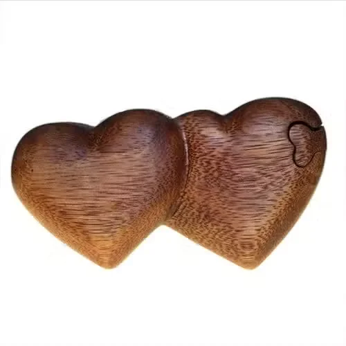 Bali decorative box with twin heart pattern on lid, open to reveal contents.