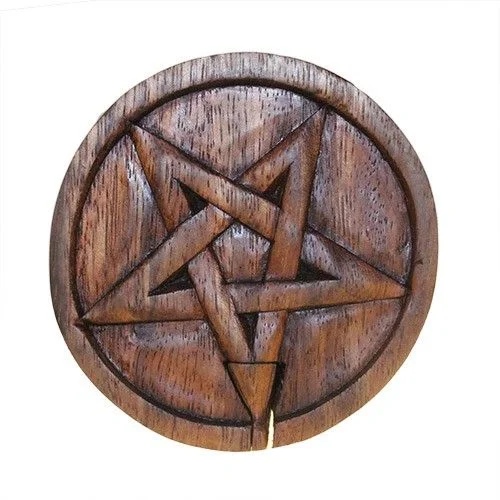 Bali magic box presented in pentagonal shape, displayed from a high angle with subtle lighting highlighting its unique geometry