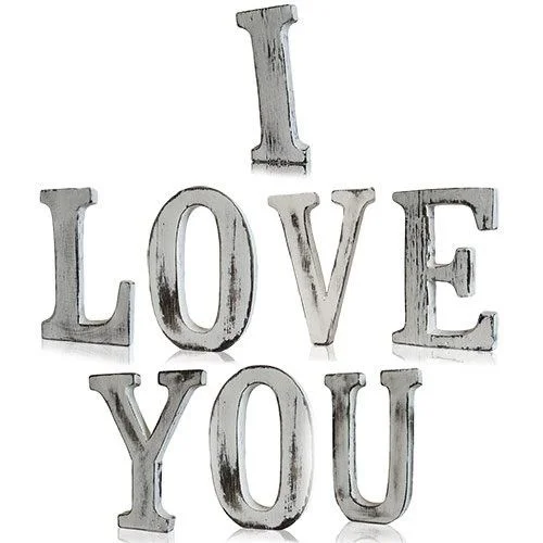 Shabby chic love letters, an arrangement of eight decorative letters spelling I LOVE YOU.