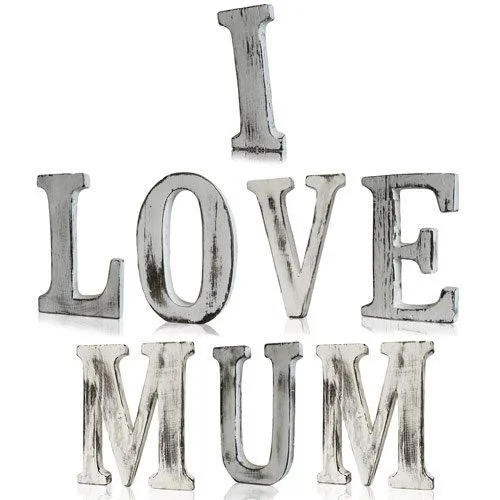 I love mum letters set in shabby chic style, wooden letters with worn paint spelling I LOVE MUM.