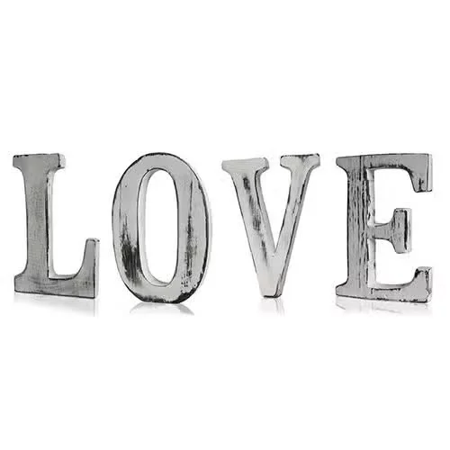 Four shabby chic letters spelling LOVE arranged as letter wall art.