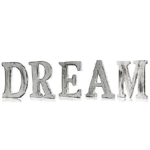 Shabby chic wall letters spelling DREAM arranged in a decorative display.