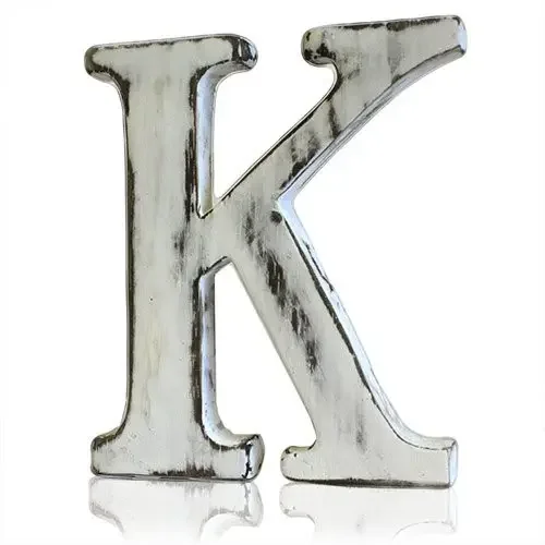 Shabby chic wall letter displaying the letter K in rustic style