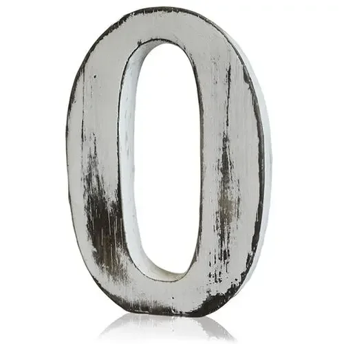 Shabby chic wall letter 'O' in distressed finish, hanging on a wall as a decorative accent.