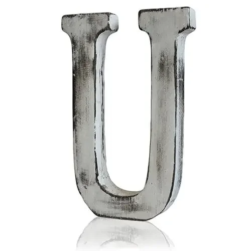 Shabby chic wall letter U, distressed decorative tile in a vintage style.