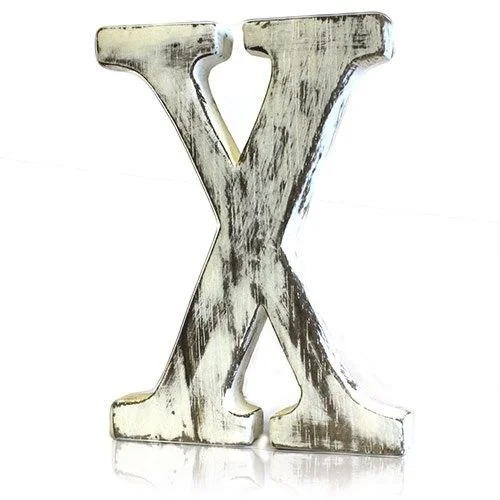 Shabby chic letters displayed on a plain surface.
