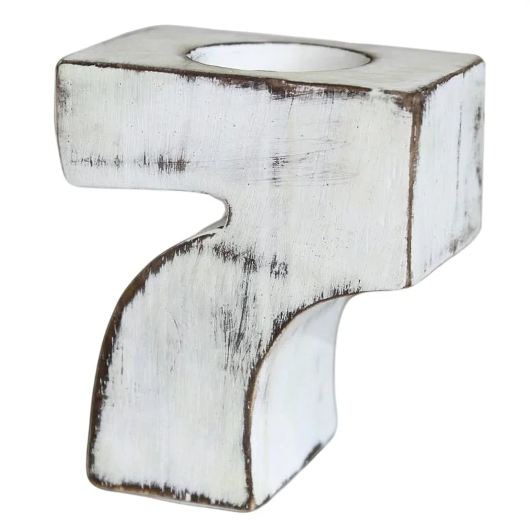 Wooden birthday number 7 displayed against a plain background.