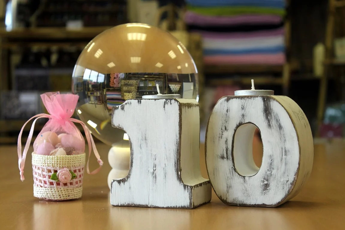 Wooden birthday number 0 on a light wood background
