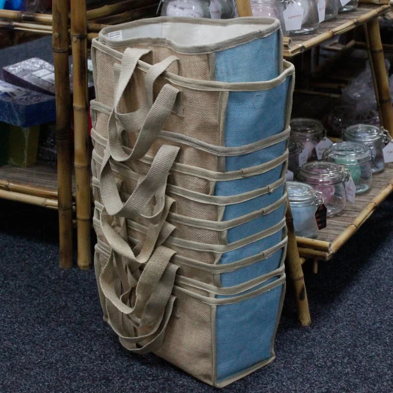 Large teal shopping basket with rectangular shape, showing its 33x18x20cm dimensions.