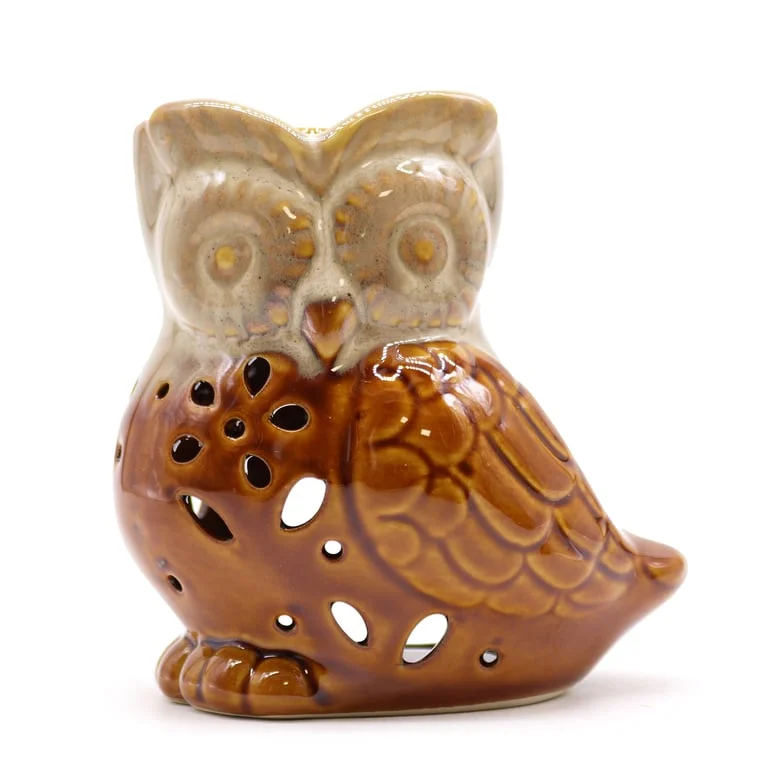 Oil burner decor with classic rustic owl side‑on design.