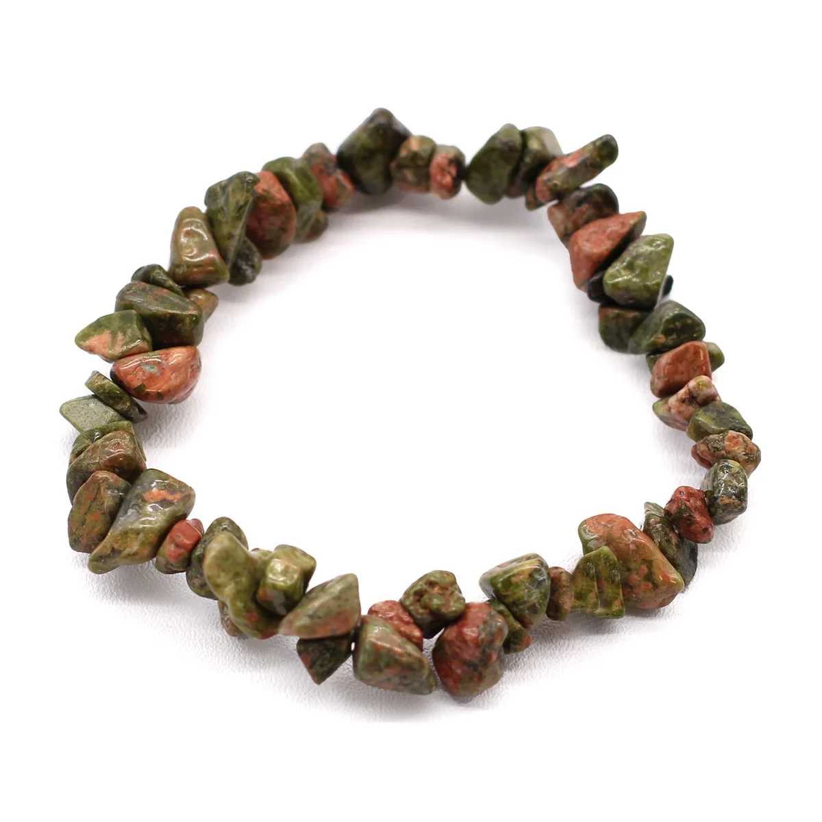 Green jasper stone bracelet displayed on a wrist.