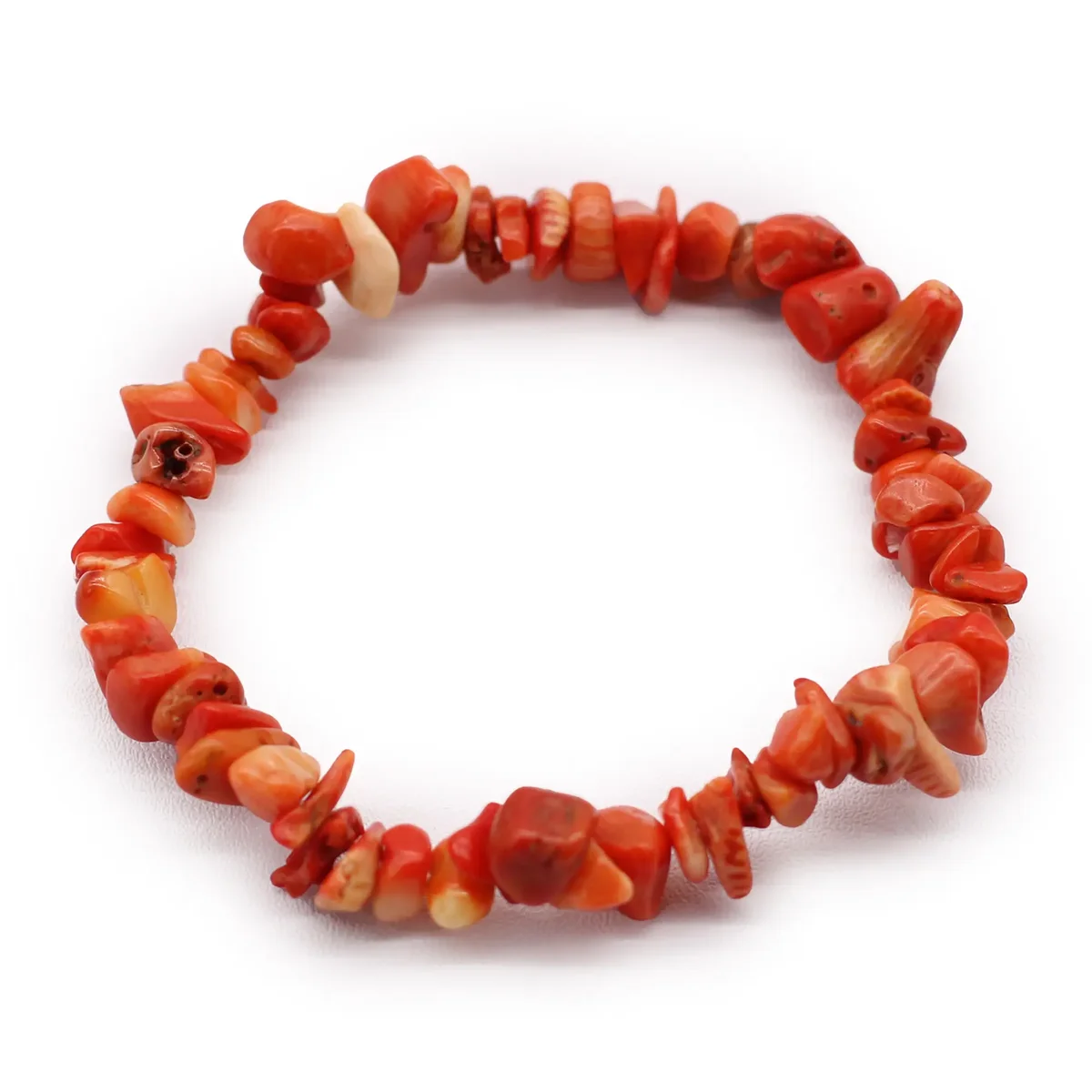 Orange jasper bracelet looped around a wrist, showcasing a subtle chipstone finish.