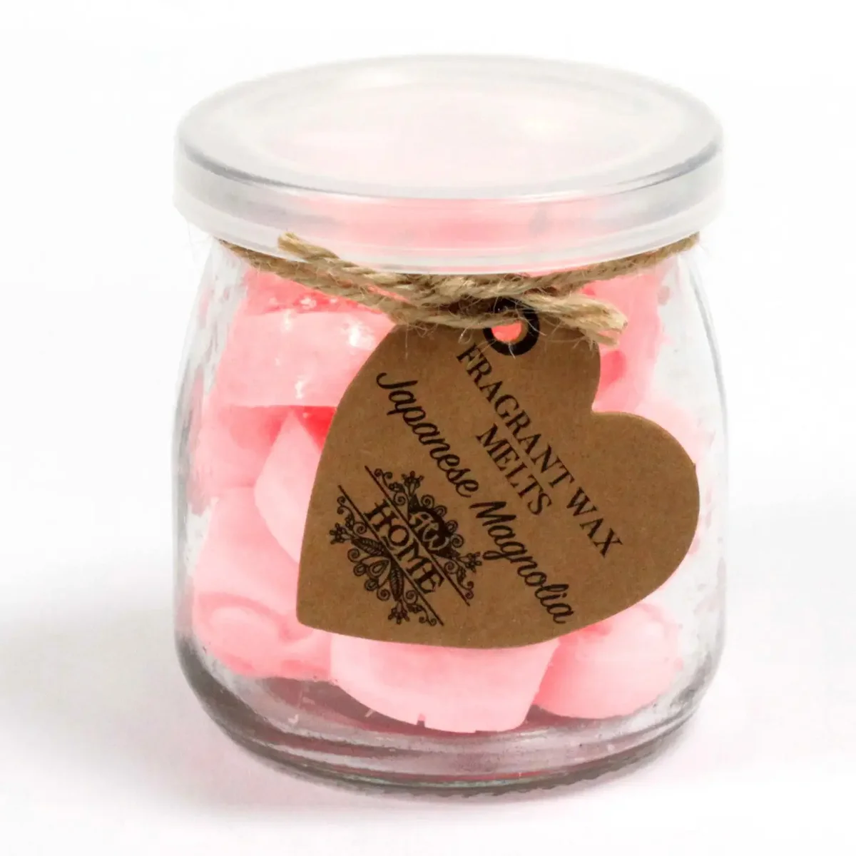 Soy wax melt jar with Japanese Magnolia wax melt, subtle amber glow and wooden lid.