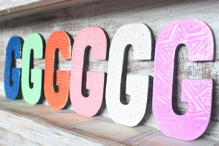 Assorted colour letter G, 15cm tall.