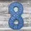 Number 8 wall decor in assorted colours, 15cm tall, suitable for wall display