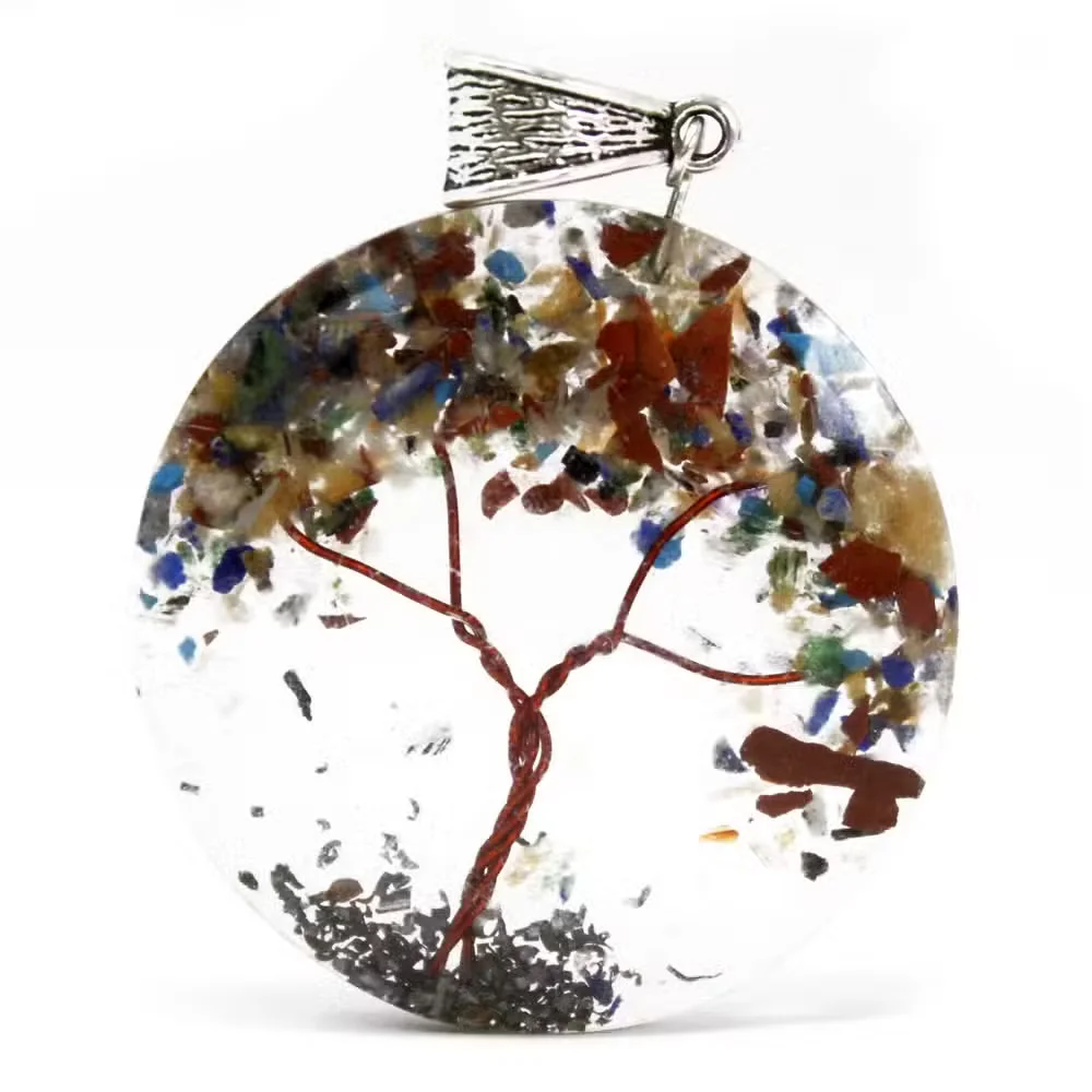 Round mixed orgonite pendant with amethyst tree design, showing layers of colored dust and crystal beads.