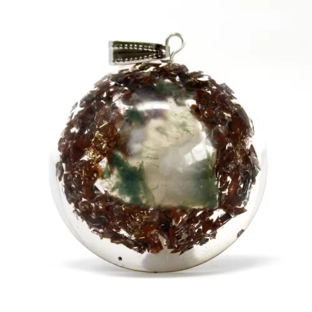 Orgonite power block pendant encased in a clear dome.