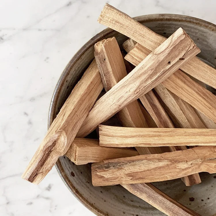 Green Tree Palo Santo sticks 25g in small cardboard box, 3‑4 sticks visible.