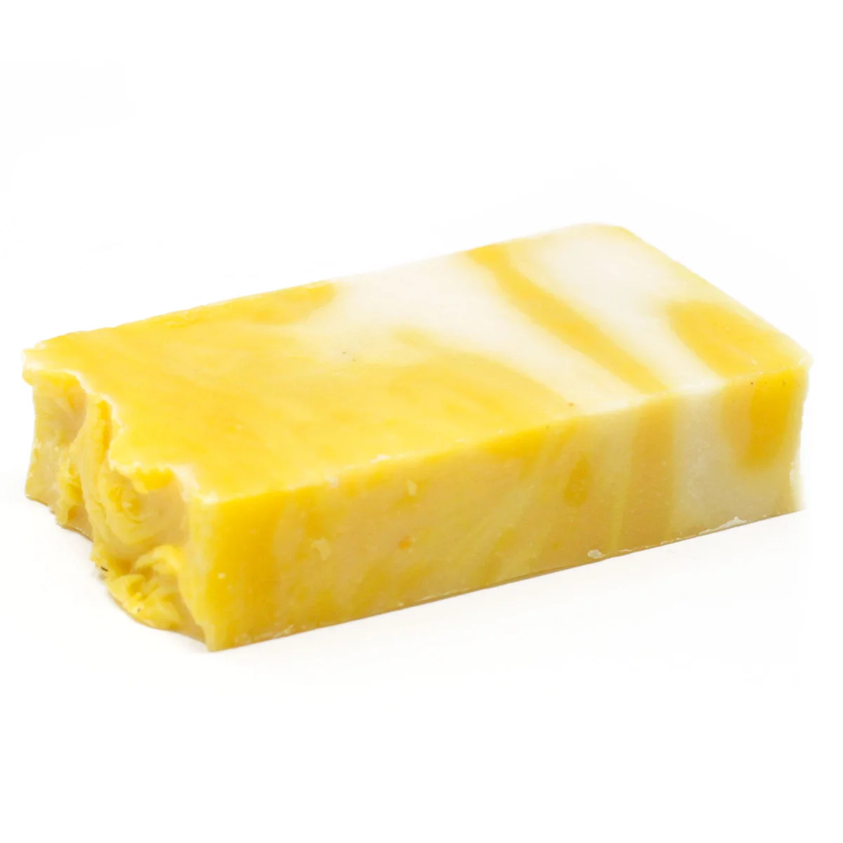 Slice of lemon scented olive oil soap weighing approximately 100g with a pale yellow color and smooth texture