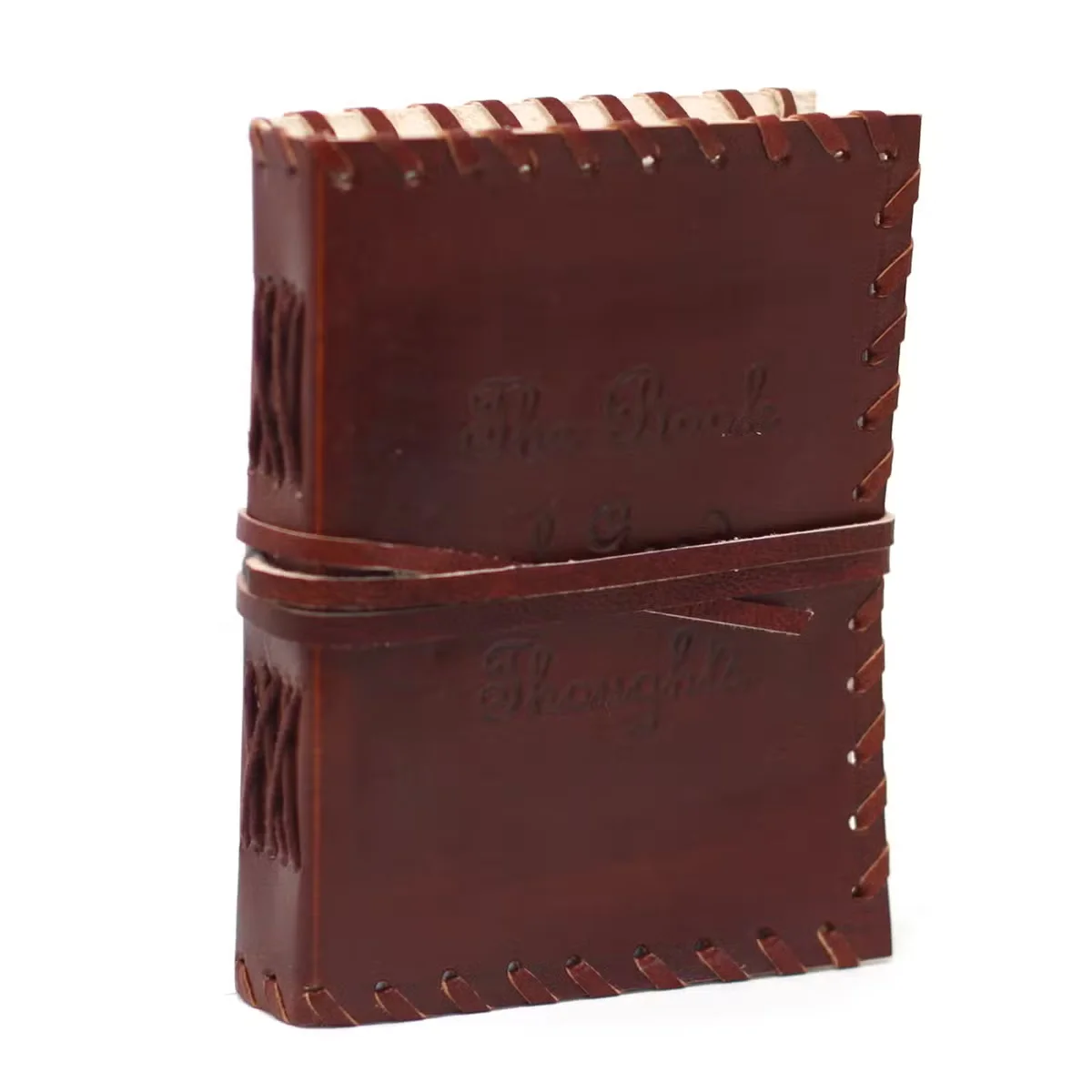 Compact leather notebook with wrap closure, showing smooth brown leather cover and stitched edges, 6x4 inches size
