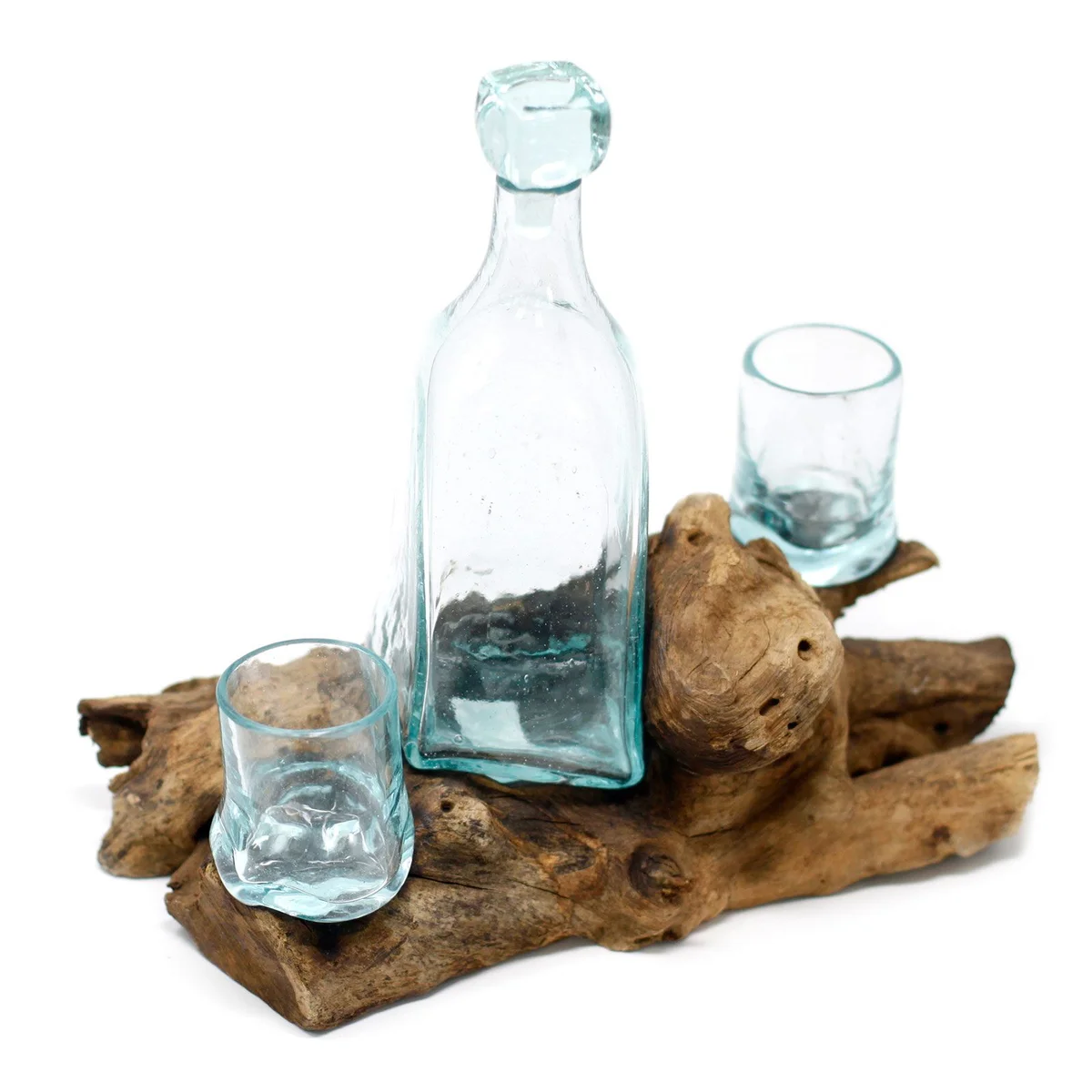 Molten glass whisky glass set resting on a wooden base, showcasing handcrafted design and natural wood grain